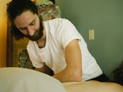 Maxfield Baker Licensed Massage Therapist of Blooming Day Spa in San Marcos Texas