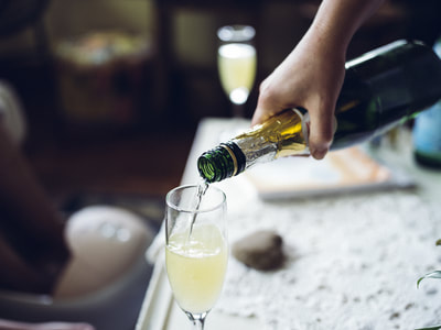 Enjoy a glass of champagne at Blooming Day Spa in San Marcos Texas